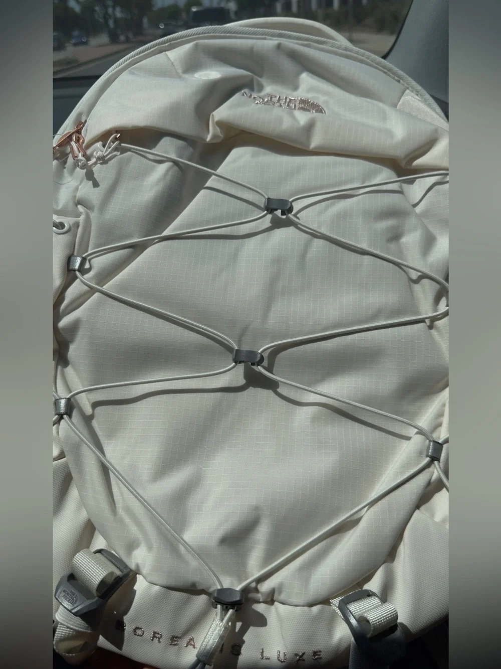 The North Face sleek cream